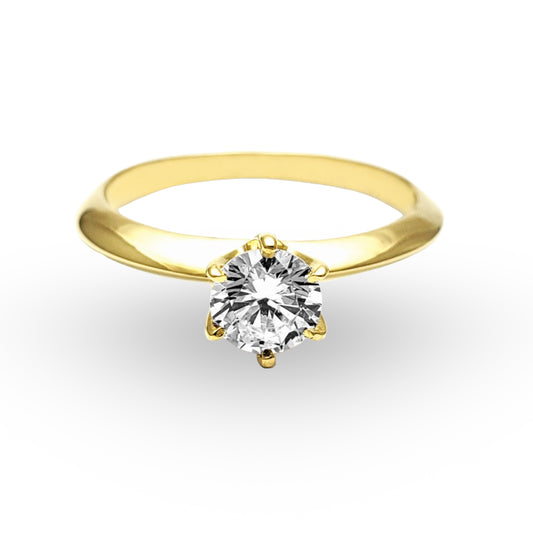 Descubra la encantadora simplicidad del Anillo de Compromiso ZABULON, una joya de Oro / Oro Rosa / Oro Blanco 14k, centrada por una zirconia que destella con promesas de un mañana compartido. Este anillo, en su refinada elegancia, no es solo un símbolo de compromiso, es una alianza de amor en su forma más pura.